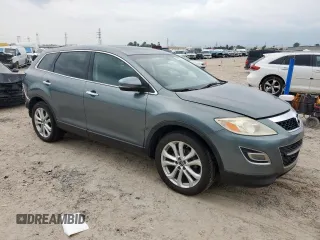 2011 Mazda CX-9 Grand Touring with VIN JM3TB2DA2B0317438, listed as a Copart auction lot 59502395 with 181,506 mi miles and Salvage title. Bid and sale history available at DreamBid. Image 4.