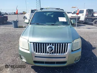 2008 Mercury Mariner Premier z VIN 4M2CU87128KJ17796, wystawiony jako IAAI lot #42296965 z przebiegiem 273 153 mil mil oraz . Historia ofert i sprzedaży dostępna na DreamBid. Obrazek 12.