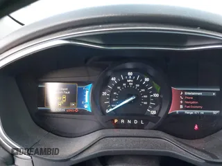 2020 Ford Fusion Hybrid SE with VIN 3FA6P0LU6LR171270, listed as a IAAI auction lot 41919266 with 106,438 mi miles. Bid and sale history available at carsss.com. Image 7.