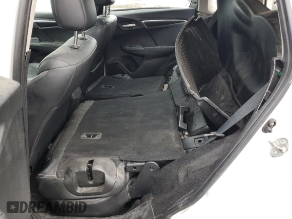 2015 Honda Fit EX-L z VIN 3HGGK5H84FM107978, wystawiony jako Copart lot #54879335 z przebiegiem 193 583 mil mil oraz Nie do naprawy • Non repairable. Historia ofert i sprzedaży dostępna na DreamBid. Obrazek 10.