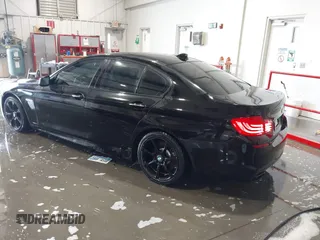 2013 BMW 5 Series 550i xDrive with VIN WBAFU9C56DDY70471, listed as a IAAI auction lot 42158400 with 100,251 mi miles and . Bid and sale history available at carsss.com. Image 3.