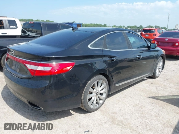 2012 Hyundai Azera with VIN KMHFH4JGXCA146499, listed as a IAAI auction lot 42519685 with 132,262 mi miles and . Bid and sale history available at DreamBid. Image 4.