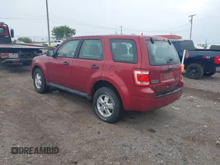 2012 Ford Escape XLS z VIN 1FMCU9C75CKB34585, wystawiony jako IAAI lot #42472033 z przebiegiem 184 695 mil mil oraz . Historia ofert i sprzedaży dostępna na DreamBid. Obrazek 3.