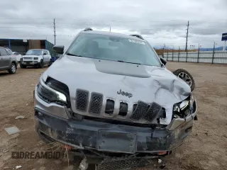 2021 Jeep Cherokee Trailhawk with VIN 1C4PJMBX2MD143446, listed as a Copart auction lot 55166945 with 83,841 mi miles and Salvage title. Bid and sale history available at DreamBid. Image 5.