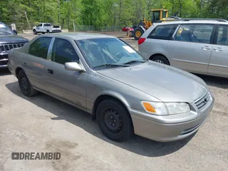 2001 Toyota Camry CE with VIN 4T1BG22KX1U072957, listed as a IAAI auction lot 42167686 with 200,126 mi miles. Bid and sale history available at carsss.com. Image 1.
