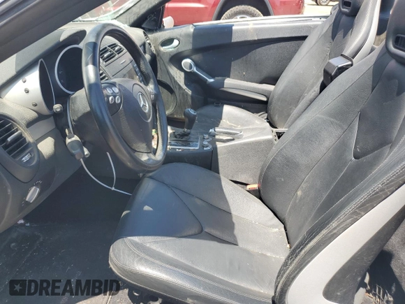 2007 Mercedes-Benz SLK-Class 3.5L with VIN WDBWK56F47F145383, listed as a Copart auction lot 59658234 with 106,491 mi miles and Salvage Title. Bid and sale history available at carsss.com. Image 7.