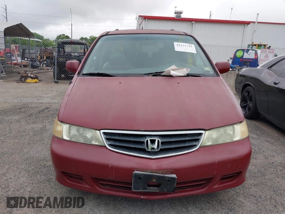 2002 Honda Odyssey EX-L z VIN 2HKRL18092H572036, wystawiony jako IAAI lot #42122713 z przebiegiem Nie podano mil oraz . Historia ofert i sprzedaży dostępna na DreamBid. Obrazek 6.