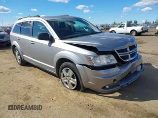 2017 Dodge Journey SE z VIN 3C4PDCAB0HT559082, wystawiony jako IAAI lot #41700719 z przebiegiem 136 561 mil mil oraz . Historia ofert i sprzedaży dostępna na DreamBid. Obrazek 1.