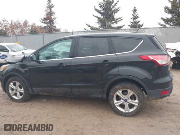 2013 Ford Escape SE with VIN 1FMCU0GX1DUD08065, listed as a IAAI auction lot 41721553 with 113,935 mi miles. Bid and sale history available at carsss.com. Image 15.