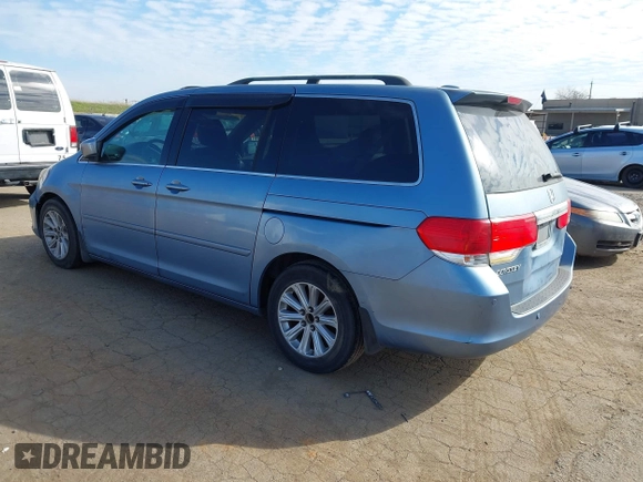 2008 Honda Odyssey Touring with VIN 5FNRL38868B047556, listed as a IAAI auction lot 41581617 with 220,436 mi miles. Bid and sale history available at carsss.com. Image 3.