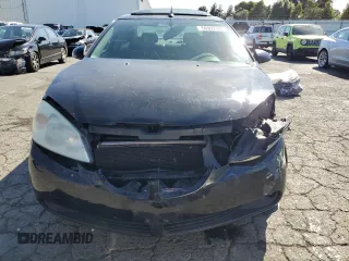 2005 Pontiac G6 GT z VIN 1G2ZH528754113674, wystawiony jako Copart lot #56992545 z przebiegiem 165 598 mil mil oraz Szkoda całkowita • Salvage title. Historia ofert i sprzedaży dostępna na DreamBid. Obrazek 5.