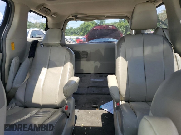 2014 Toyota Sienna XLE with VIN 5TDYK3DC8ES414814, listed as a Copart auction lot 64577875 with 111,675 mi miles and Salvage title. Bid and sale history available at DreamBid. Image 10.