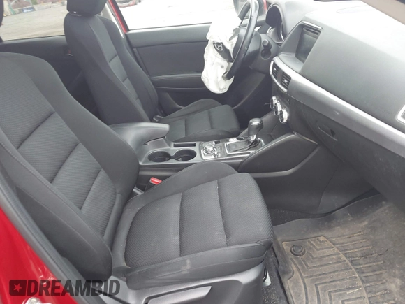 2016 Mazda CX-5 Touring with VIN JM3KE4CY2G0894930, listed as a IAAI auction lot 41906809 with 123,125 mi miles. Bid and sale history available at carsss.com. Image 5.