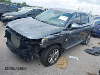2020 Hyundai Santa Fe SE z VIN 5NMS23AD3LH155930, wystawiony jako IAAI lot #42155889 z przebiegiem 64 441 mil mil oraz . Historia ofert i sprzedaży dostępna na DreamBid. Obrazek 18.
