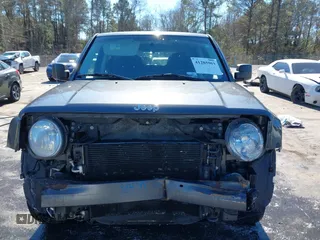 2014 Jeep Patriot Latitude with VIN 1C4NJRFB3ED886007, listed as a IAAI auction lot 41285963 with 127,007 mi miles and . Bid and sale history available at DreamBid. Image 13.