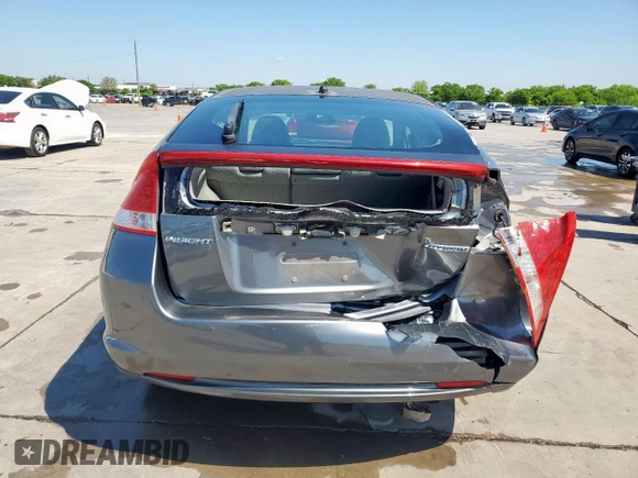 2010 Honda Insight LX with VIN JHMZE2H56AS042097, listed as a Copart auction lot 53972215 with 107,182 mi miles and Salvage Title. Bid and sale history available at DreamBid. Image 6.