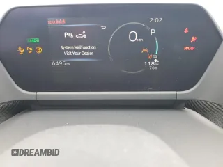 2023 Subaru Solterra Premium z VIN JTMABABA9PA016535, wystawiony jako Copart lot #45106524 z przebiegiem 6 495 mil mil oraz . Historia ofert i sprzedaży dostępna na DreamBid. Obrazek 9.