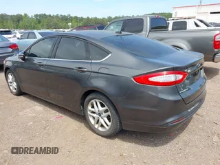 2016 Ford Fusion SE with VIN 3FA6P0H7XGR319039, listed as a IAAI auction lot 42051350 with 107,301 mi miles. Bid and sale history available at carsss.com. Image 3.