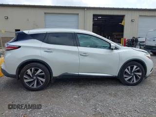 2015 Nissan Murano Platinum z VIN 5N1AZ2MG5FN204541, wystawiony jako IAAI lot #42225020 z przebiegiem 145 900 mil mil oraz . Historia ofert i sprzedaży dostępna na DreamBid. Obrazek 13.