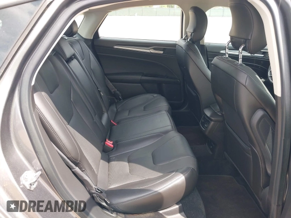 2014 Ford Fusion Titanium with VIN 3FA6P0SU0ER269411, listed as a IAAI auction lot 42163704 with 169,355 mi miles and . Bid and sale history available at DreamBid. Image 8.