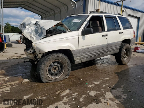 1996 Jeep Grand Cherokee Laredo with VIN 1J4GZ58S9TC277492, listed as a Copart auction lot 66732404 with Not provided miles and Salvage title. Bid and sale history available at DreamBid. Image 1.