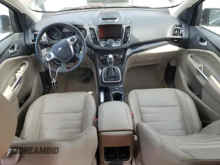 2014 Ford Escape Titanium с VIN 1FMCU0J9XEUA27152, выставлен на аукционе Copart как лот 60246715 с пробегом 182 550 миль миль и Чистый • Clean title. История ставок и продаж доступна на DreamBid. Изображение 8.