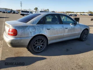 2000 Audi S4 z VIN WAUDD68DXYA129608, wystawiony jako Copart lot #50731165 z przebiegiem 177 081 mil mil oraz Czysty tytuł • Clean title. Historia ofert i sprzedaży dostępna na DreamBid. Obrazek 3.