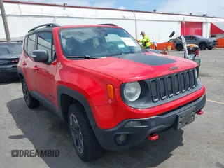 2015 Jeep Renegade Trailhawk z VIN ZACCJBCT7FPB80933, wystawiony jako IAAI lot #42461878 z przebiegiem 138 803 mil mil oraz . Historia ofert i sprzedaży dostępna na DreamBid. Obrazek 1.