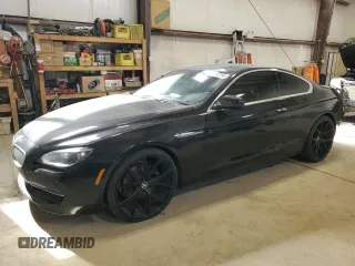 2012 BMW 6 Series 650i xDrive z VIN WBALX5C57CC894348, wystawiony jako Copart lot #61391185 z przebiegiem 88 923 mil mil oraz Czysty tytuł • Clean title. Historia ofert i sprzedaży dostępna na DreamBid. Obrazek 1.