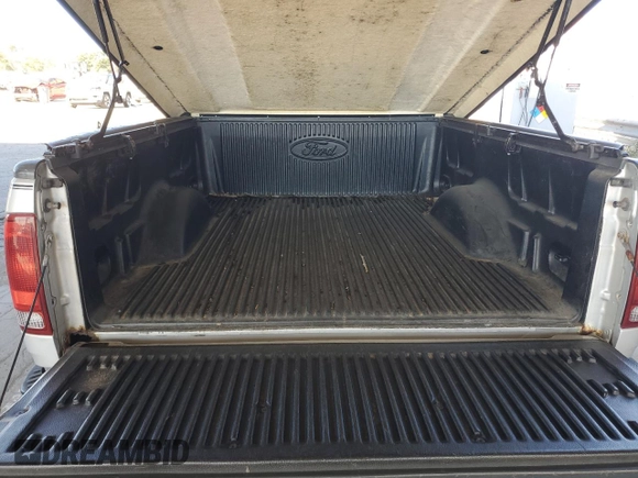 1999 Ford F-150 XL with VIN 1FTRF17L7XNA73732, listed as a Copart auction lot 74388514 with Not provided miles and Clean title. Bid and sale history available at DreamBid. Image 10.