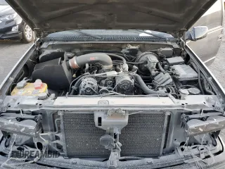 1999 Chevrolet Tahoe with VIN 3GNEC18R1XG143882, listed as a Copart auction lot 42177005 with 130,368 mi miles and Salvage title. Bid and sale history available at DreamBid. Image 12.