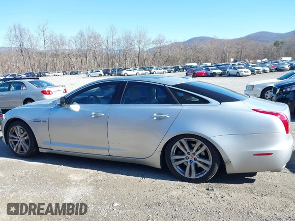 2014 Jaguar XJ z VIN SAJWJ1CD0E8V63989, wystawiony jako IAAI lot #41643513 z przebiegiem 119 924 mil mil oraz . Historia ofert i sprzedaży dostępna na DreamBid. Obrazek 17.