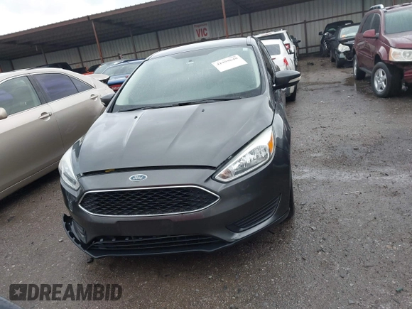 2015 Ford Focus SE with VIN 1FADP3F28FL219552, listed as a IAAI auction lot 41959648 with 128,590 mi miles. Bid and sale history available at carsss.com. Image 12.