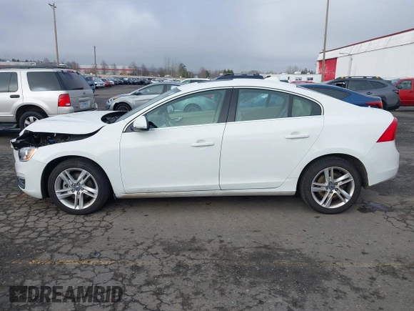 2015 Volvo S60 T5 Drive-E Premier with VIN YV126MFK4F2349564, listed as a IAAI auction lot 41711836 with 59,897 mi miles. Bid and sale history available at carsss.com. Image 14.