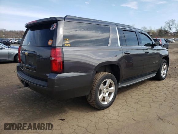 2016 Chevrolet Suburban LT with VIN 1GNSKHKC8GR107397, listed as a Copart auction lot 51874705 with 137,916 mi miles and Salvage Title. Bid and sale history available at DreamBid. Image 3.