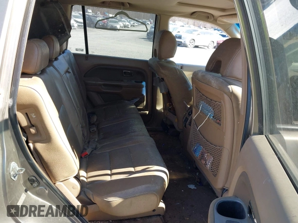 2008 Honda Pilot EX-L with VIN 5FNYF18778B052859, listed as a IAAI auction lot 41695095 with 249,207 mi miles and . Bid and sale history available at DreamBid. Image 8.