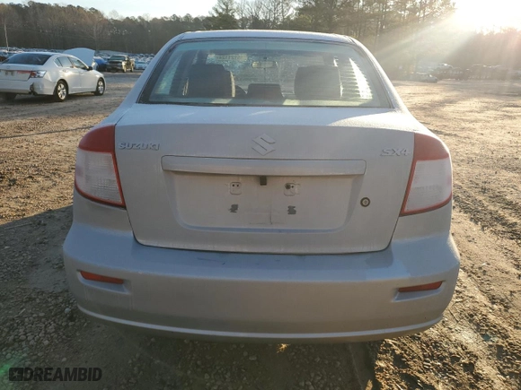 2012 Suzuki SX4 LE with VIN JS2YC5A38C6300439, listed as a Copart auction lot 85121124 with 74,324 mi miles and Clean Title. Bid and sale history available at carsss.com. Image 6.