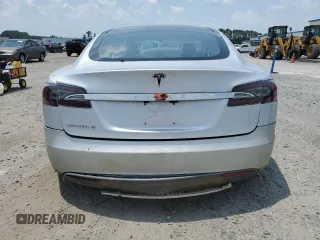 2013 Tesla Model S с VIN 5YJSA1DNXDFP04134, выставлен на аукционе Copart как лот 62660125 с пробегом 150 560 миль миль и Чистый • Clean title. История ставок и продаж доступна на DreamBid. Изображение 6.