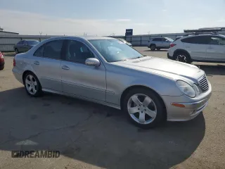 2005 Mercedes-Benz E 5.0L with VIN WDBUF70J55A617413, listed as a Copart auction lot 43297435 with 103,271 mi miles and Clean Title. Bid and sale history available at carsss.com. Image 4.