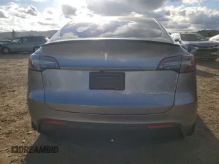2024 Tesla Model Y Performance with VIN 7SAYGDEF2RF113873, listed as a Copart auction lot 46181915 with 19,625 mi miles and Salvage Title. Bid and sale history available at DreamBid. Image 6.