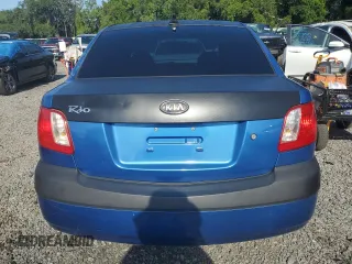 2009 Kia Rio LX with VIN KNADE223296515613, listed as a Copart auction lot 62008194 with 143,238 mi miles and Salvage Title. Bid and sale history available at carsss.com. Image 6.