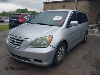 2010 Honda Odyssey EX with VIN 5FNRL3H48AB017784, listed as a IAAI auction lot 42096852 with 126,138 mi miles. Bid and sale history available at carsss.com. Image 2.