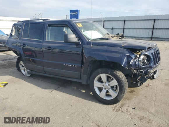 2014 Jeep Patriot Latitude with VIN 1C4NJPFA9ED509614, listed as a Copart auction lot 52938095 with 29,212 mi miles and Salvage title. Bid and sale history available at DreamBid. Image 4.