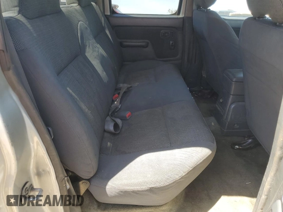 2002 Nissan Frontier XE z VIN 1N6ED29X72C374187, wystawiony jako Copart lot #55688645 z przebiegiem 354 656 mil mil oraz Szkoda całkowita • Salvage title. Historia ofert i sprzedaży dostępna na DreamBid. Obrazek 10.
