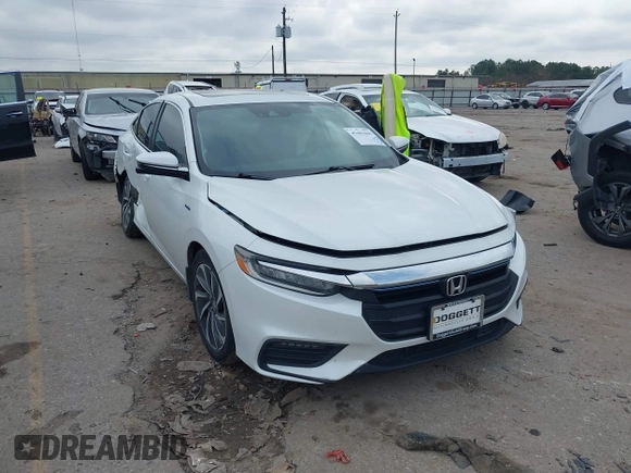 2020 Honda Insight Touring with VIN 19XZE4F90LE009301, listed as a IAAI auction lot 41661665 with 73,673 mi miles and . Bid and sale history available at carsss.com. Image 1.
