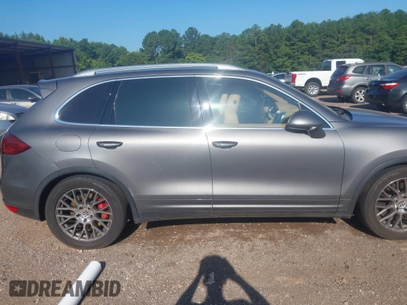 2012 Porsche Cayenne Turbo z VIN WP1AC2A29CLA81105, wystawiony jako IAAI lot #42618593 z przebiegiem 173 873 mil mil oraz . Historia ofert i sprzedaży dostępna na DreamBid. Obrazek 14.