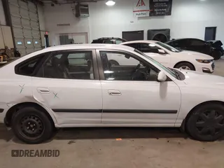 2005 Hyundai Elantra GLS with VIN KMHDN56D65U171907, listed as a IAAI auction lot 41051694 with 103,899 mi miles and . Bid and sale history available at DreamBid. Image 13.