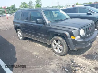 2014 Jeep Patriot Latitude z VIN 1C4NJPFA9ED763968, wystawiony jako IAAI lot #42395766 z przebiegiem 134 504 mil mil oraz . Historia ofert i sprzedaży dostępna na DreamBid. Obrazek 1.