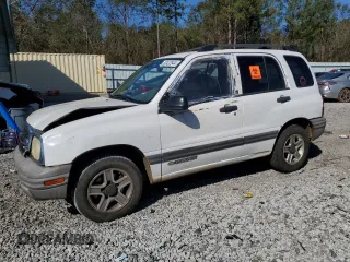 2003 Chevrolet Tracker z VIN 2CNBE13C736912038, wystawiony jako Copart lot #80422844 z przebiegiem 242 512 mil mil oraz Szkoda całkowita • Salvage title. Historia ofert i sprzedaży dostępna na DreamBid. Obrazek 1.