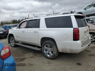 2017 Chevrolet Suburban Premier with VIN 1GNSKJKC6HR305372, listed as a Copart auction lot 47477705 with 141,324 mi miles and Salvage Title. Bid and sale history available at DreamBid. Image 2.